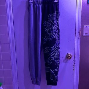 Joggers: Front(1st pic) Back (2nd pic) split design(half dragon print/half grey)